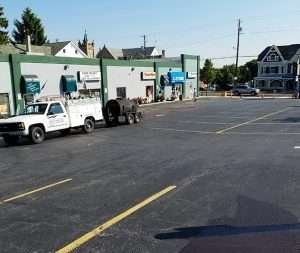 A parking lot with a truck parked in it.