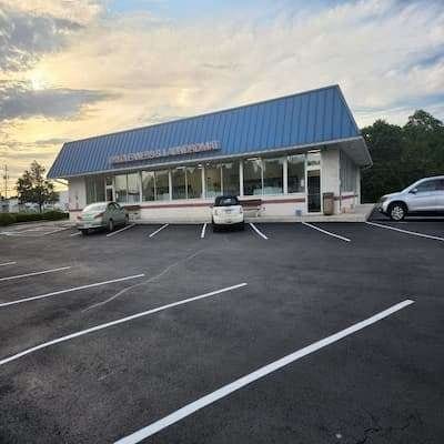 Parking Lot resurfacing in central pa|A building in Central PA with cars parked in front.