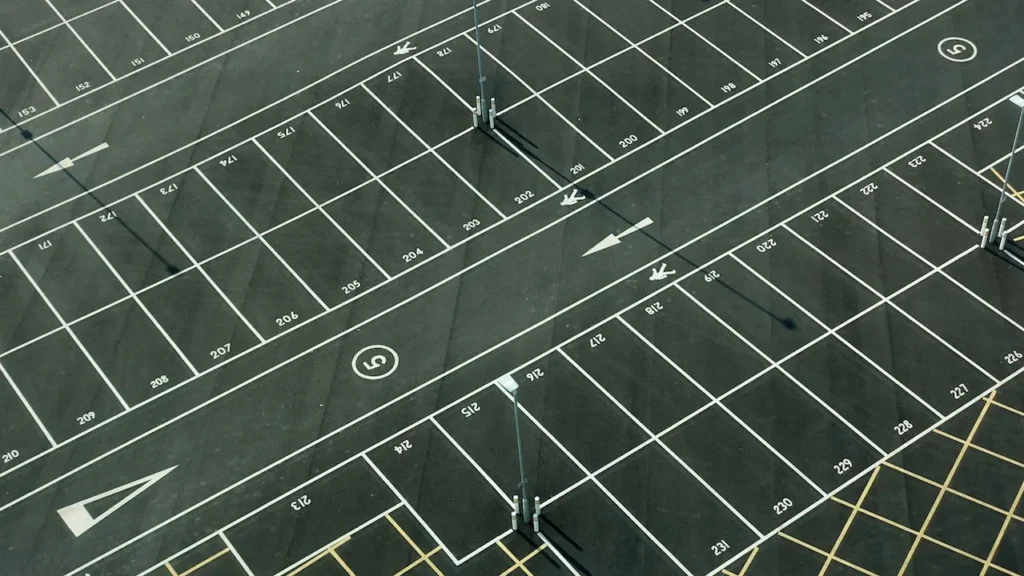 An aerial view showcasing parking lot striping.