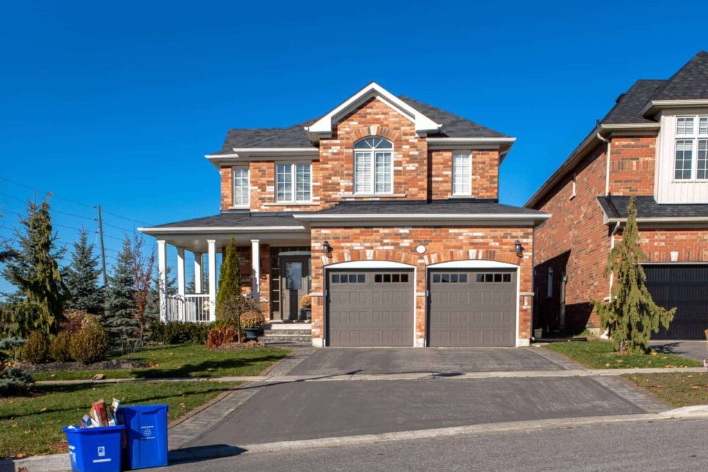 house with a new driveway|A house with a new driveway.