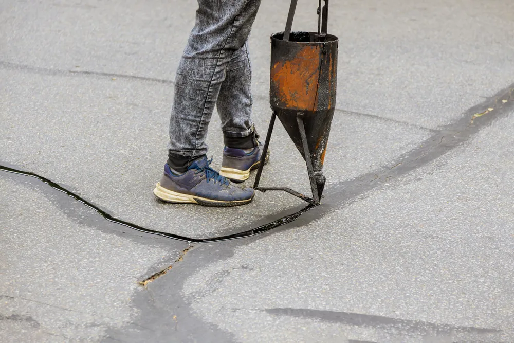 Paving sealing cracks in the asphalt